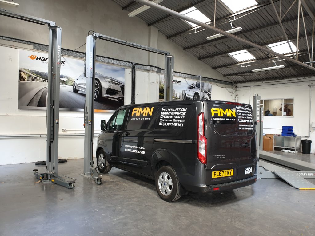 AMN garage assist completing the installation work for the brand new Mr Tyre Warwick site.